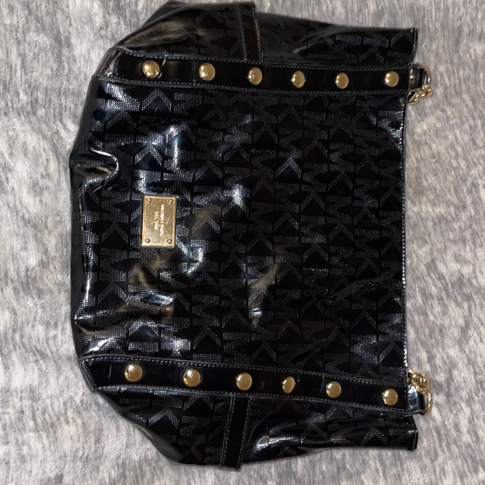 Michael Kors handbag. Large black patent leather. Lots of room.